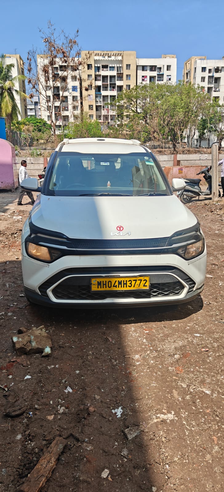 Kia Carens commercial cab — Sure Cabs Pune