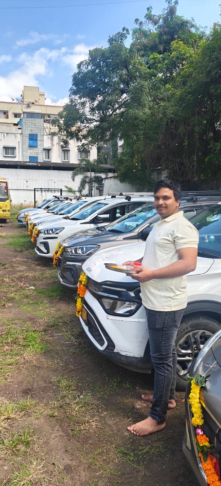 Sure Cabs fleet line-up with owner — Pune
