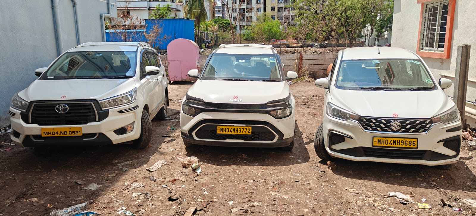 Innova Crysta, Kia Carens and Maruti Ertiga at Sure Cabs Pune